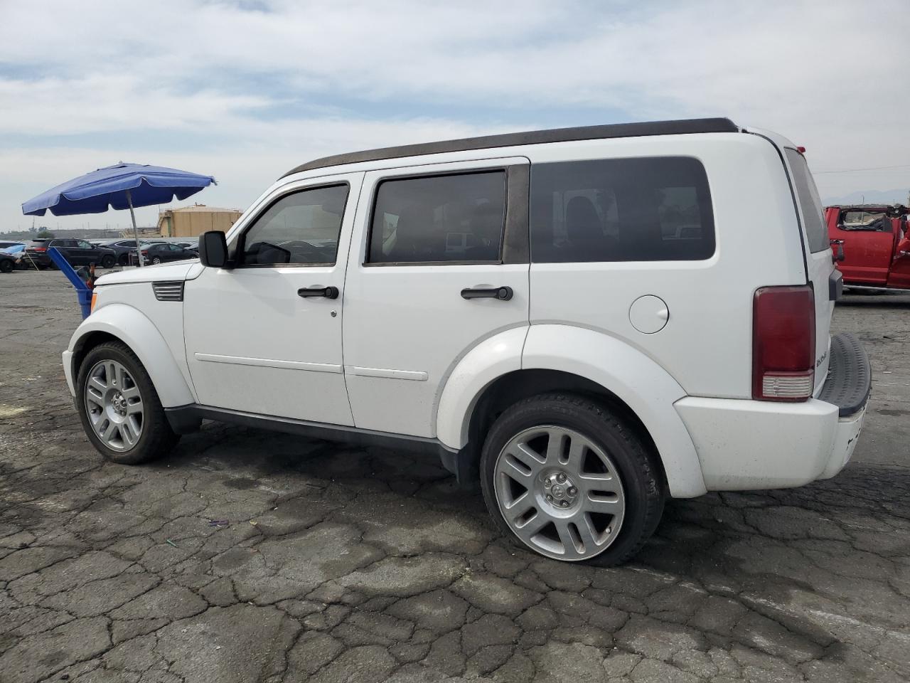 2011 Dodge Nitro VIN 1D4PT4GK7BW589801 Copart auction photo, rear end damage thumbnail 2