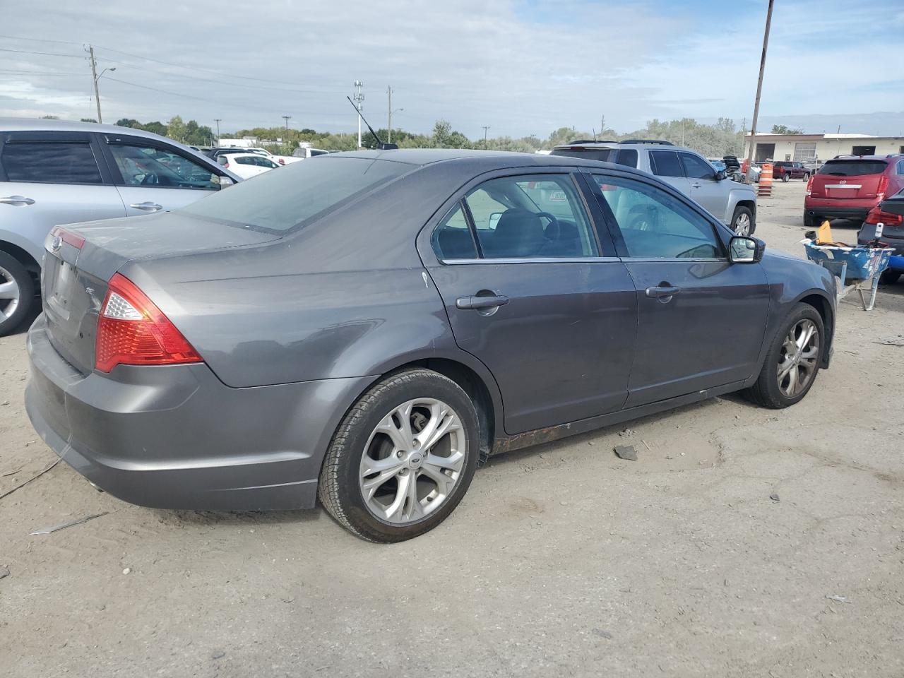 2012 Ford Fusion VIN 3FAHP0HA1CR129337 Copart auction photo, side / minor dent/scratches damage thumbnail 3