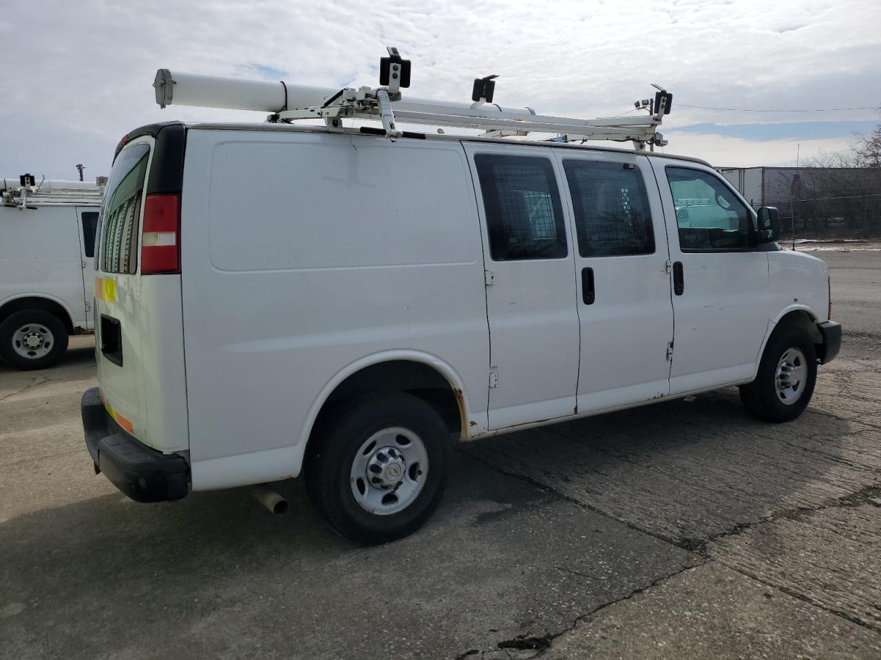 2013 Chevrolet Express VIN 1GCWGFCA3D1903689 Copart auction photo, minor dent/scratches damage thumbnail 3