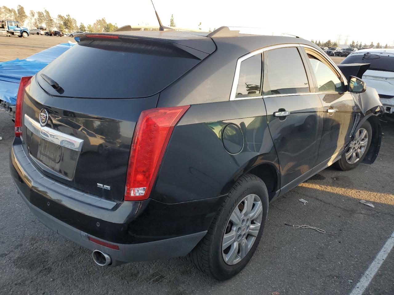 2014 Cadillac SRX VIN 3GYFNBE35ES561458 Copart auction photo, front end damage thumbnail 3