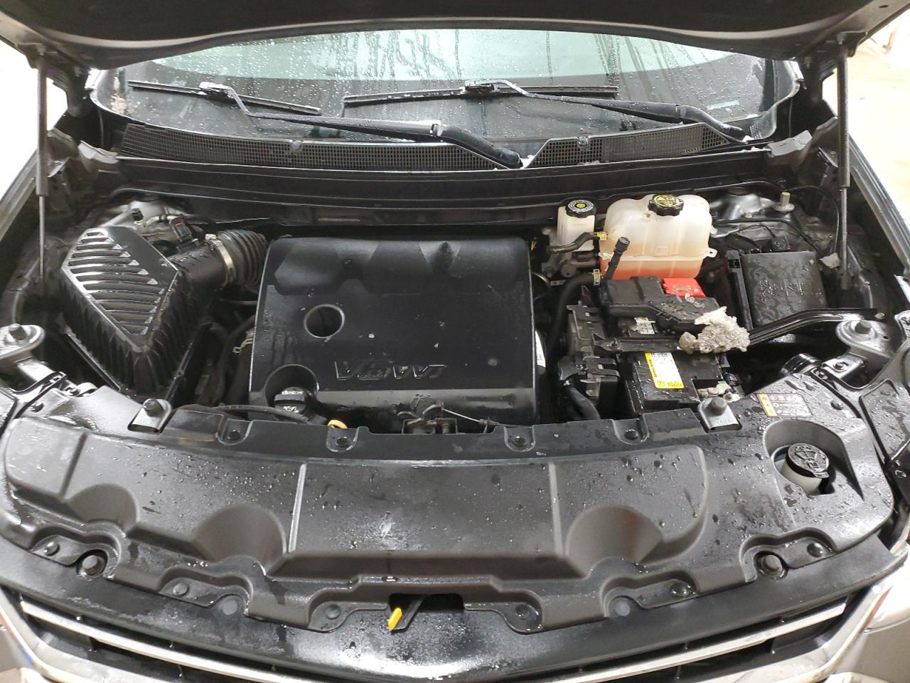 2019 Chevrolet Traverse VIN 1GNEVHKW7KJ121524 Copart auction photo, rear end / minor dent/scratches damage thumbnail 12