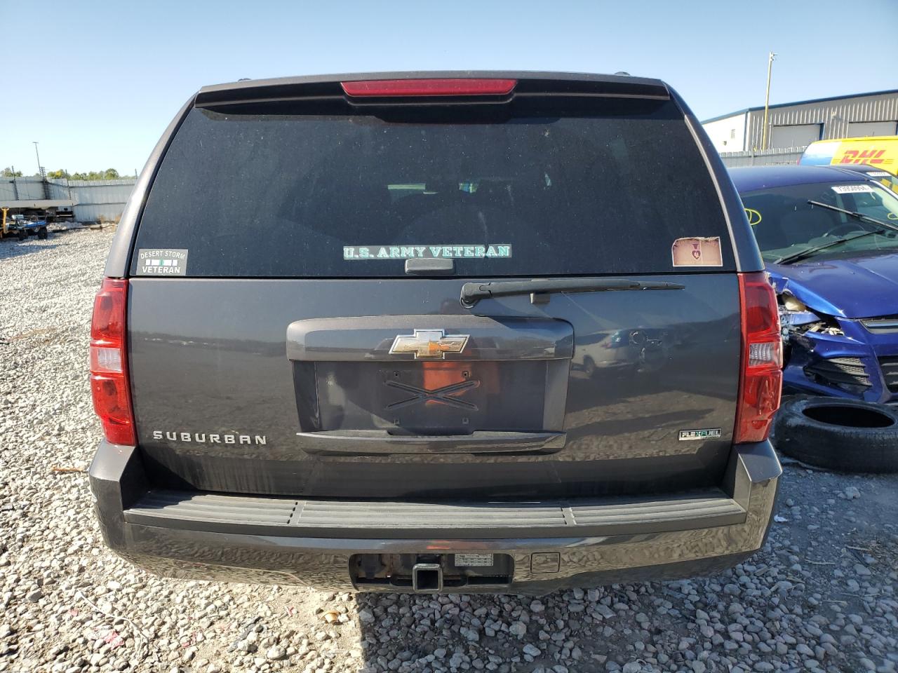 2010 Chevrolet Suburban VIN 1GNUKHE39AR226118 Copart auction photo, front end / side damage thumbnail 6
