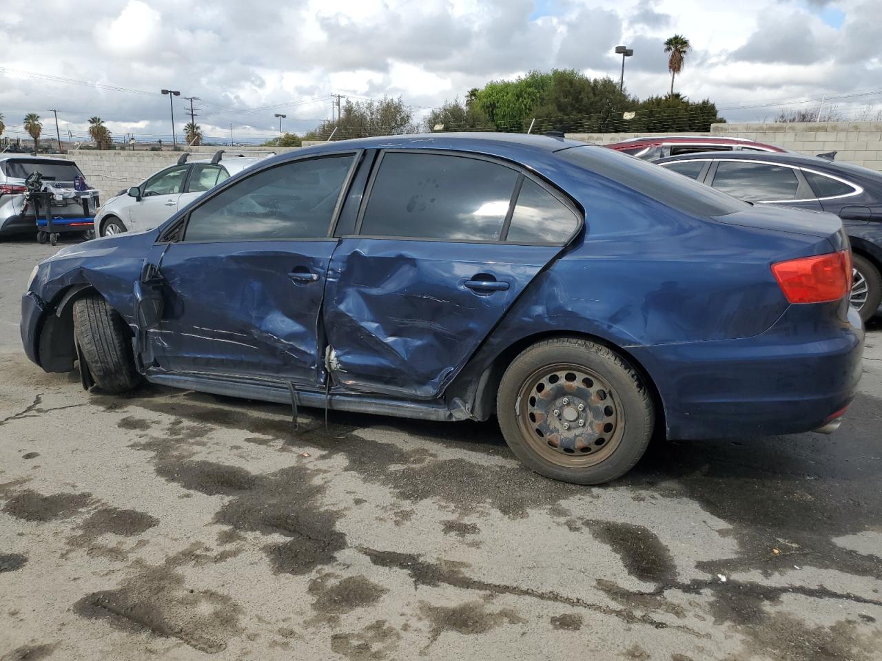 2014 Volkswagen Jetta VIN 3VWD17AJ9EM397241 Copart auction photo, side / front end damage thumbnail 2
