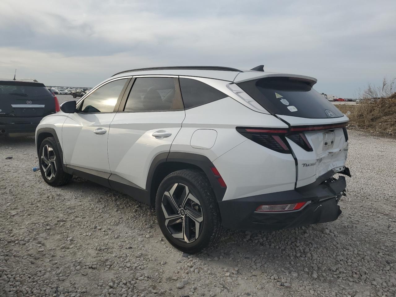 2022 Hyundai Tucson VIN 5NMJFCAE8NH069721 Copart auction photo, rear end / minor dent/scratches damage thumbnail 2