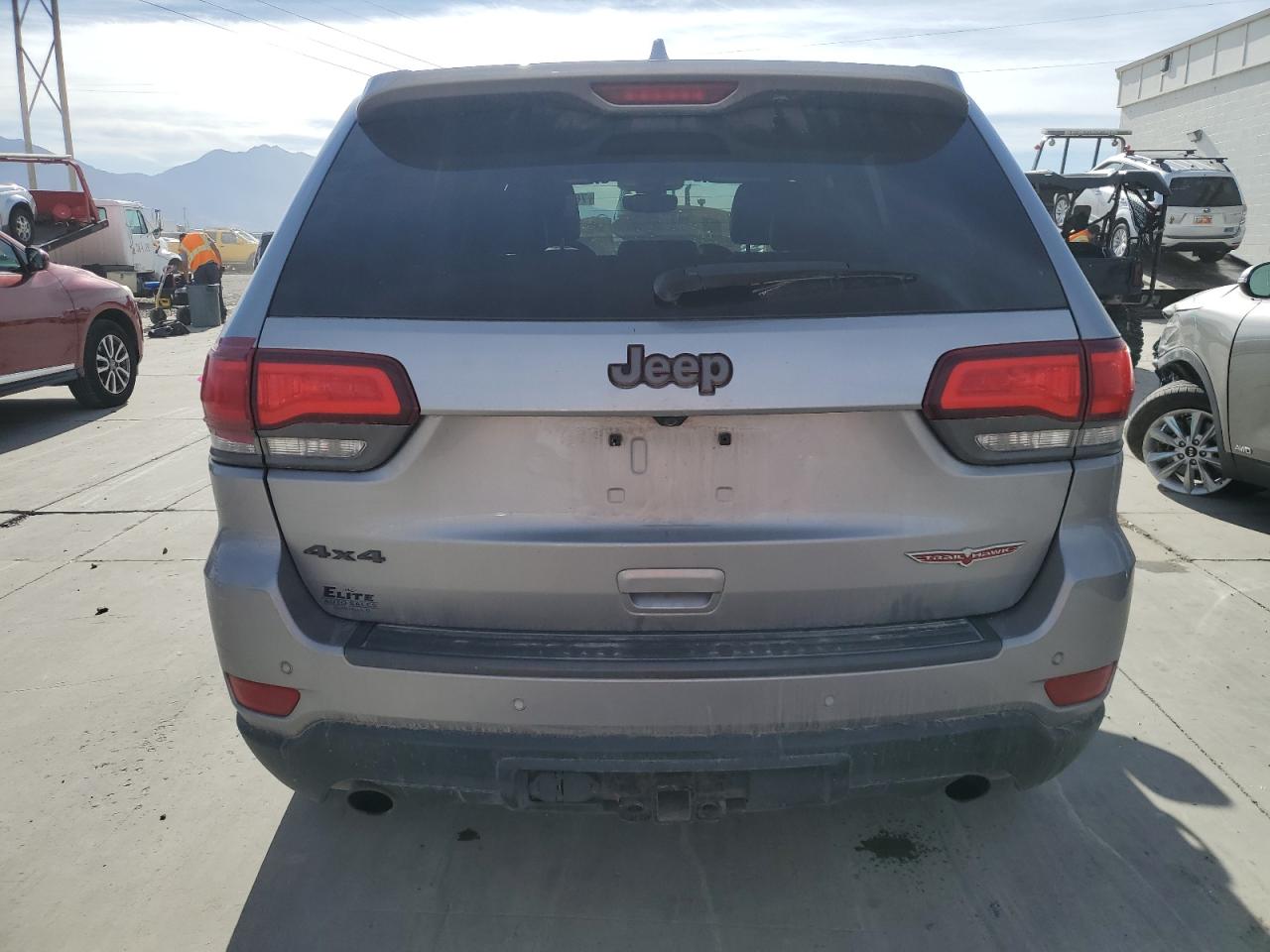 2017 Jeep Grand Cherokee VIN 1C4RJFLT1HC765192 Copart auction photo, rear end damage thumbnail 6