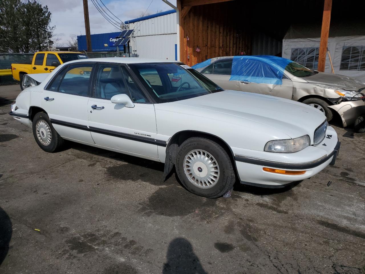 1997 Buick LeSabre VIN 1G4HP52K5VH471981 Copart auction photo, rear end / hail damage thumbnail 4
