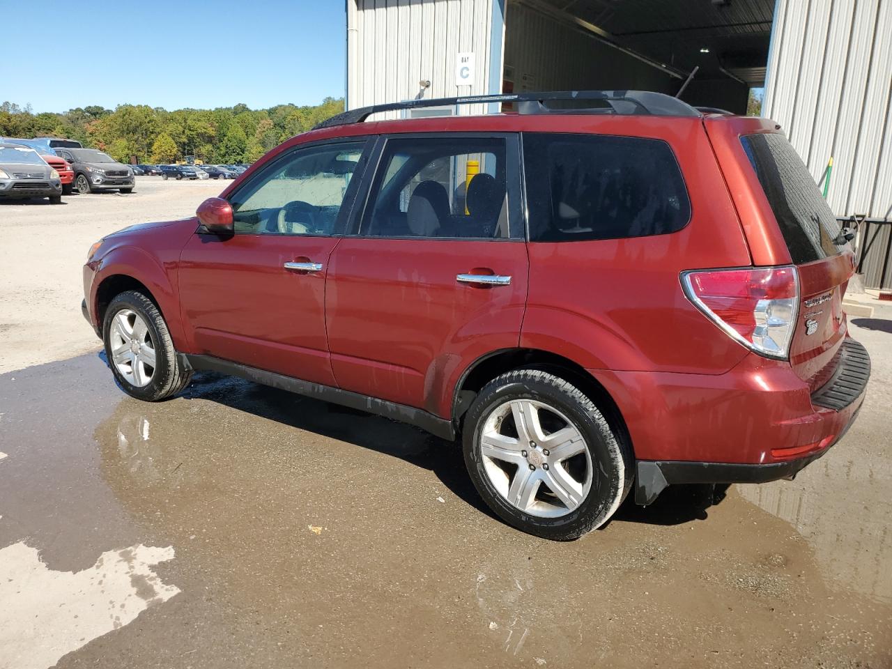 2010 Subaru Forester VIN JF2SH6CC8AH806621 Copart auction photo, side damage thumbnail 2