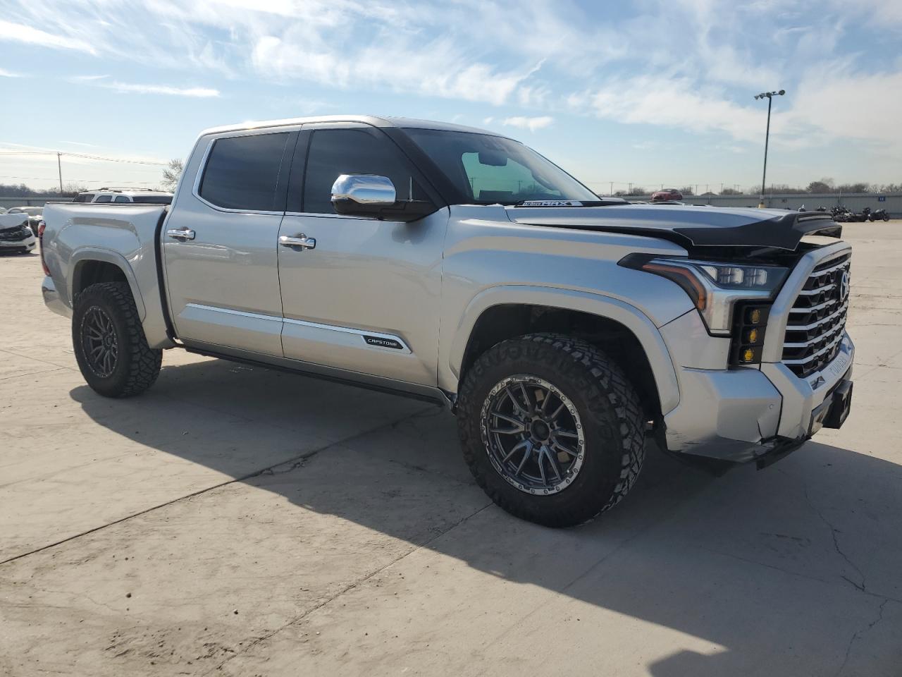 2023 Toyota Tundra VIN 5TFVC5DB9PX027091 Copart auction photo, all over damage thumbnail 4