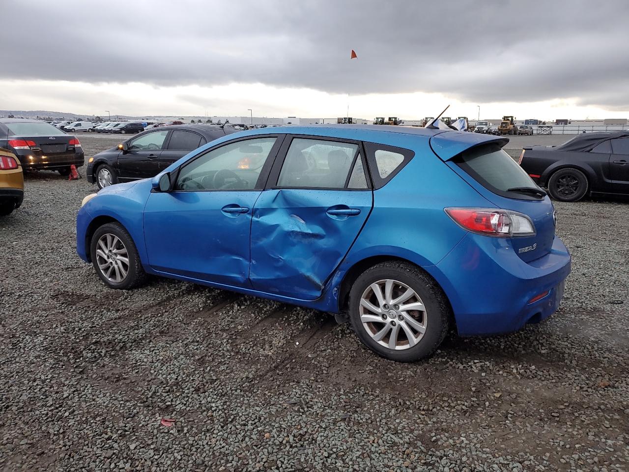 2012 Mazda 3 VIN JM1BL1M82C1585779 Copart auction photo, side / rear end damage thumbnail 2