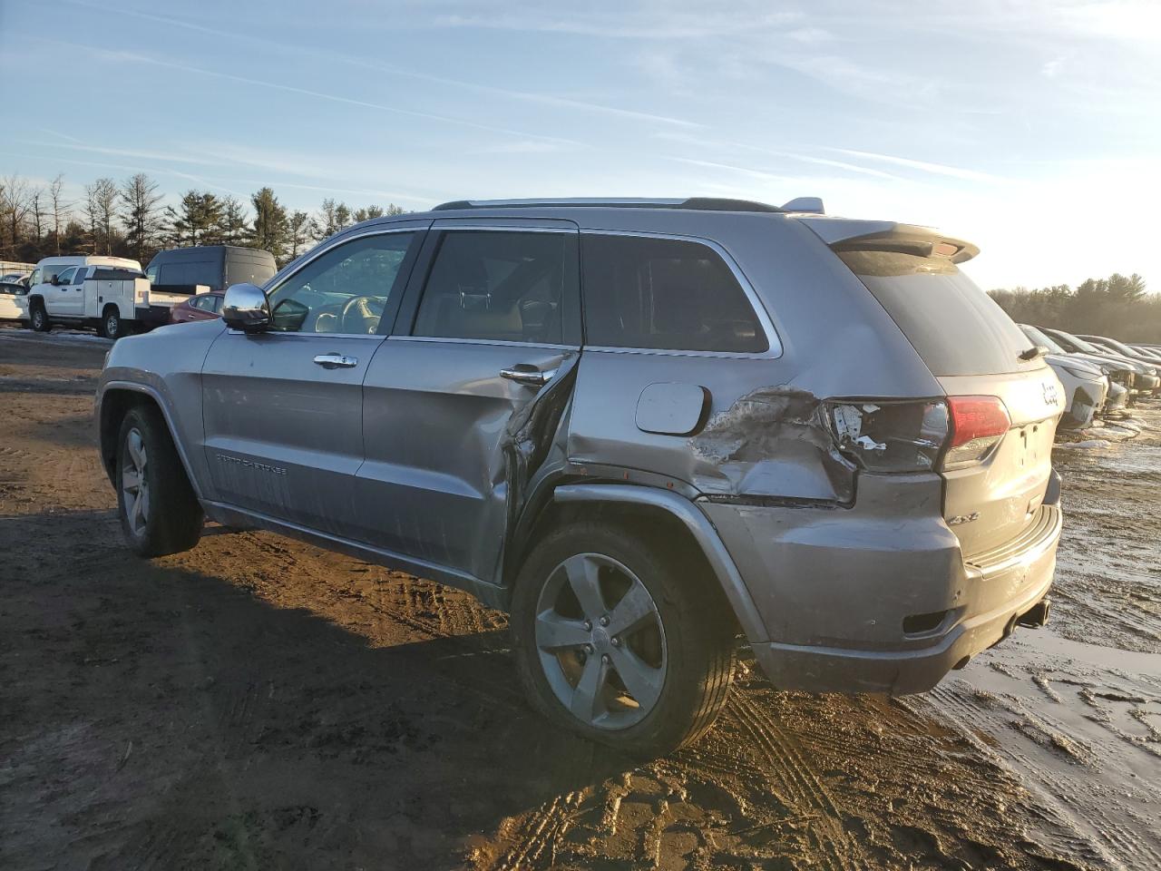 2014 Jeep Grand Cherokee VIN 1C4RJFCT2EC337580 Copart auction photo, side / rear end damage thumbnail 2