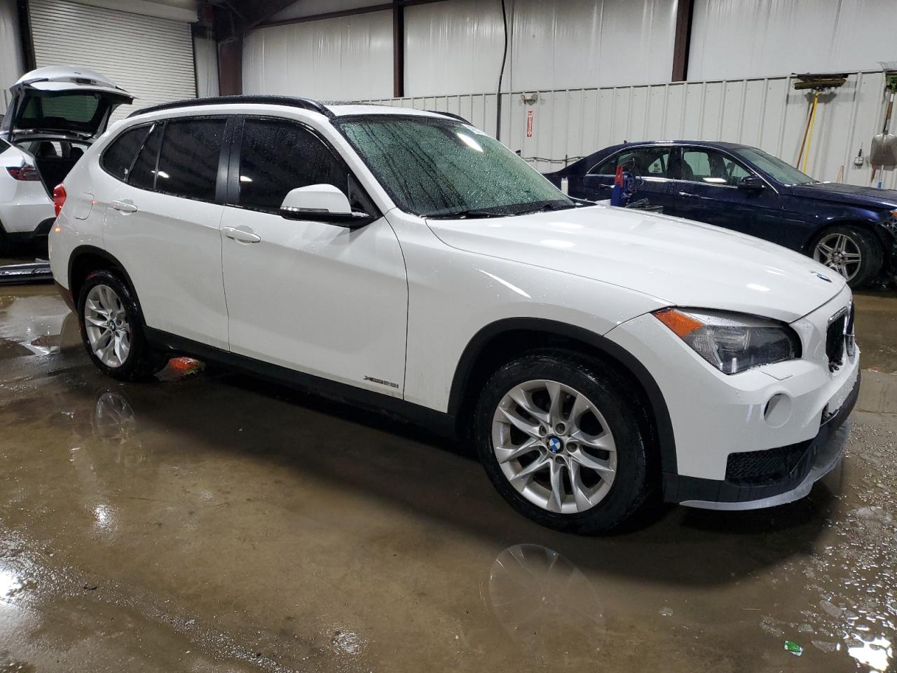 2015 BMW X1 VIN WBAVL1C51FVY34247 Copart auction photo, rear end damage thumbnail 4