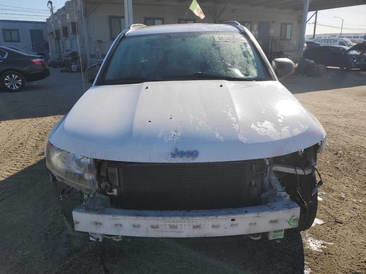 2016 Jeep Compass VIN 1C4NJCBA0GD641582 Copart auction photo, front end / rear end damage thumbnail 5