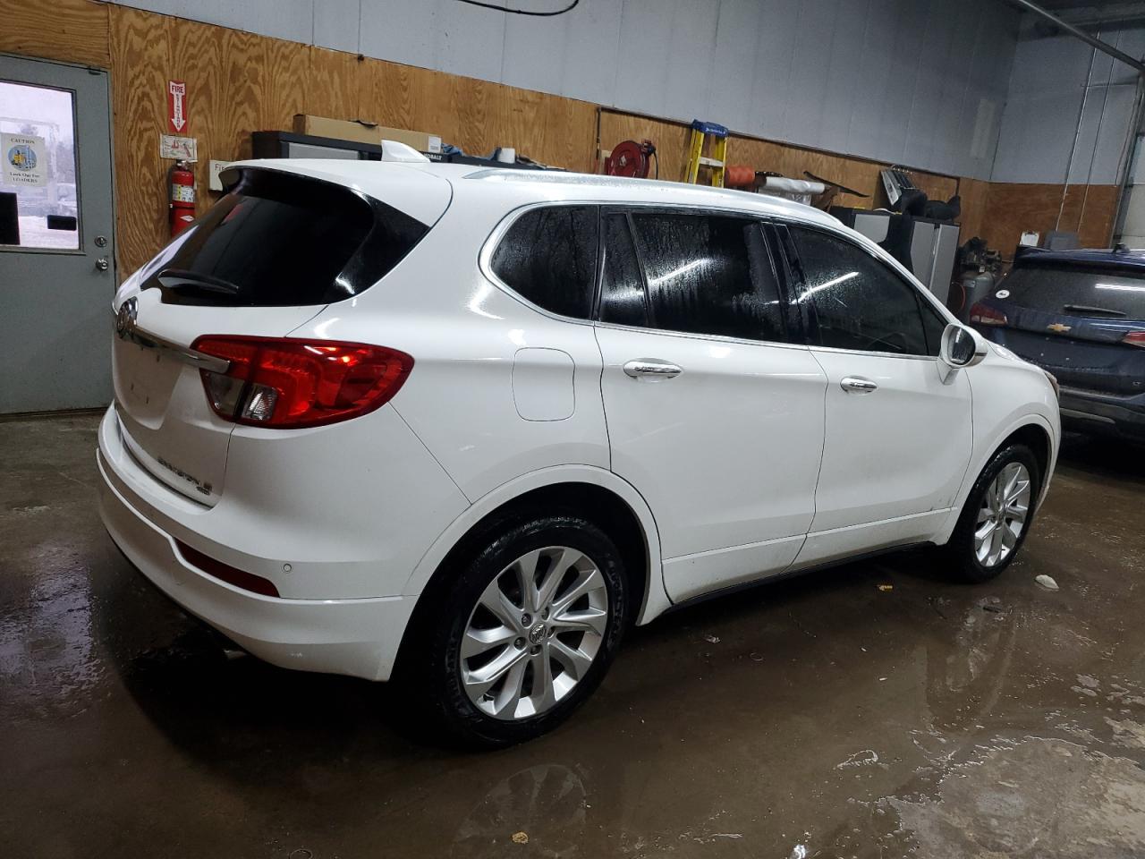 2017 Buick Envision VIN LRBFXESX3HD118172 Copart auction photo, front end / minor dent/scratches damage thumbnail 3