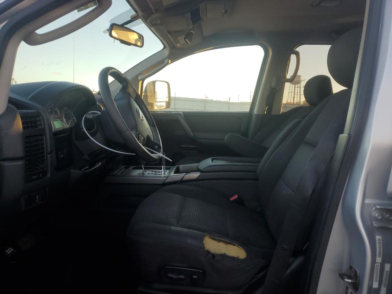 2010 Nissan Titan VIN 1N6AA0EC3AN311847 Copart auction photo, side / front end damage thumbnail 7