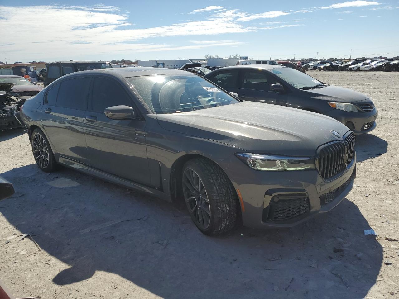 2021 BMW 7er VIN WBA7U2C05MCF09340 Copart auction photo, rear end / minor dent/scratches damage thumbnail 4
