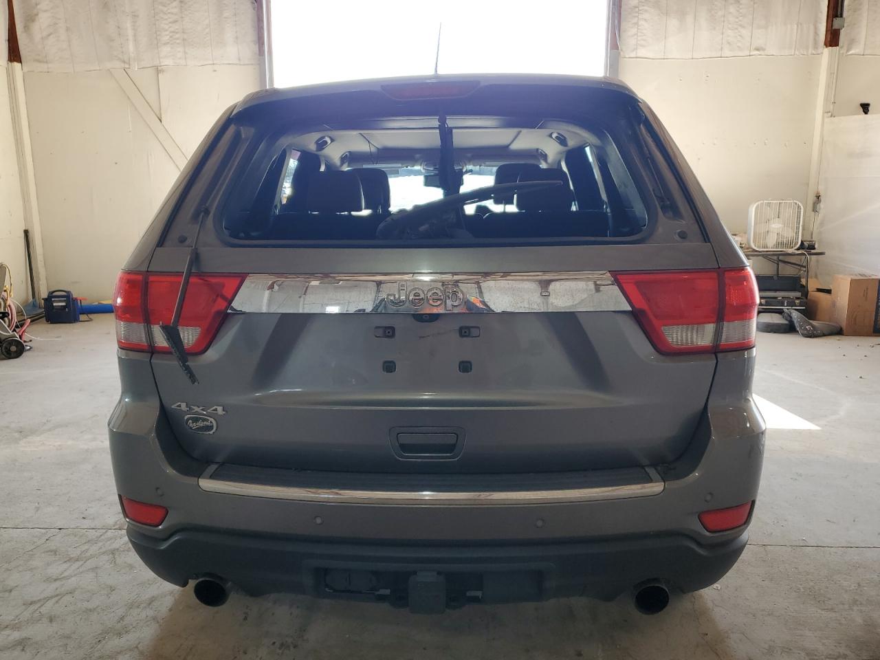 2012 Jeep Grand Cherokee VIN 1C4RJFCTXCC132330 Copart auction photo, rear end / side damage thumbnail 6