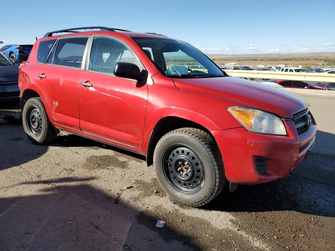2010 Toyota RAV 4 VIN JTMBK4DV1A5086682 Copart auction photo, side / all over damage thumbnail 4