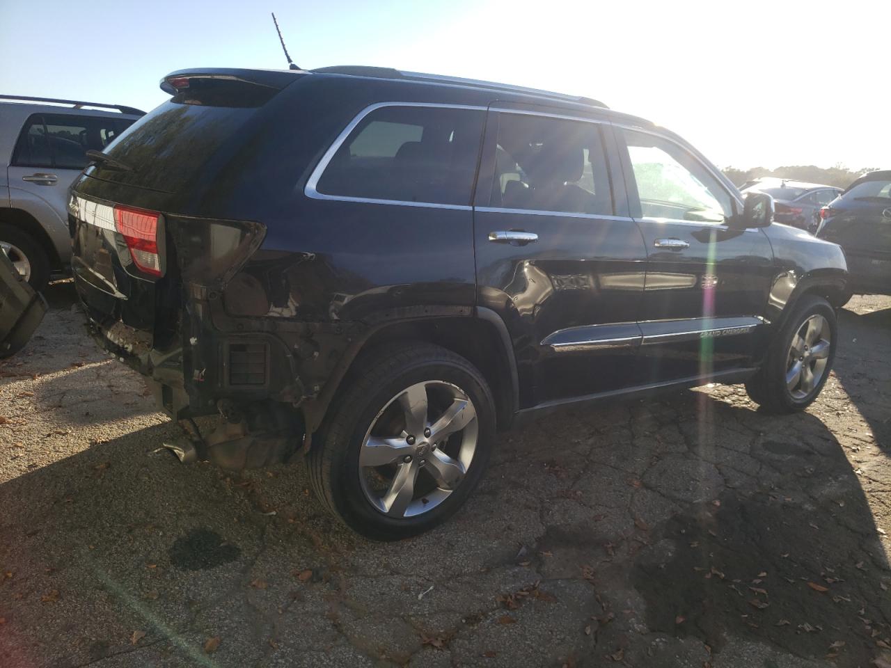 2011 Jeep Grand Cherokee VIN 1J4RS6GG7BC646610 Copart auction photo, front end / rear end damage thumbnail 3