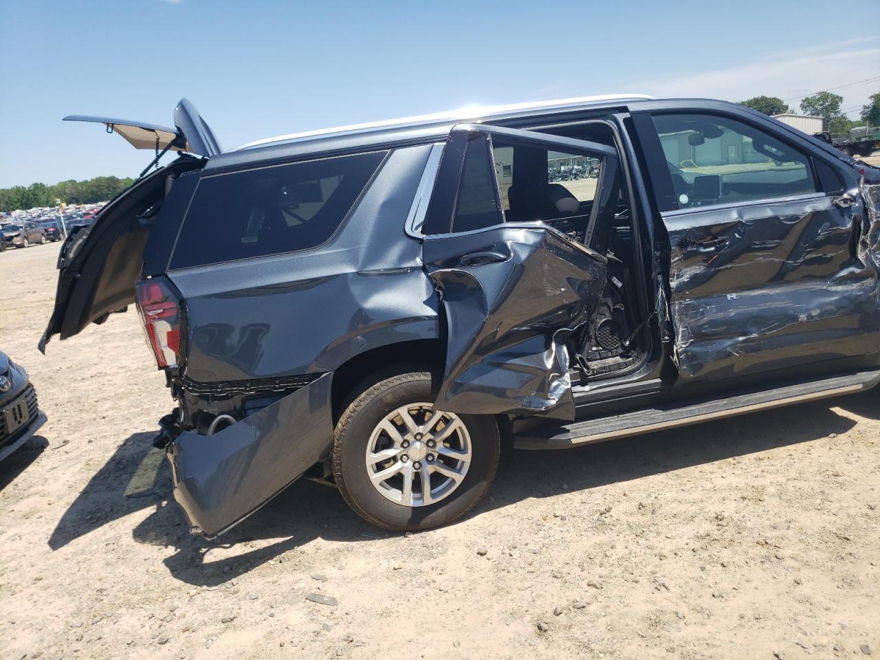 2021 Chevrolet Tahoe VIN 1GNSCNKD5MR277071 Copart auction photo, all over / minor dent/scratches damage thumbnail 9
