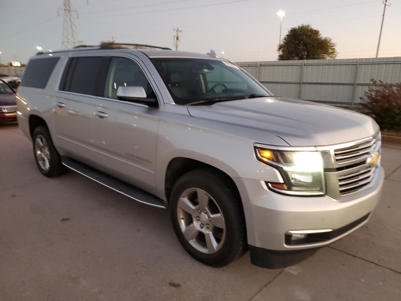2017 Chevrolet Suburban VIN 1GNSKJKC9HR179251 Copart auction photo, hail / minor dent/scratches damage thumbnail 4
