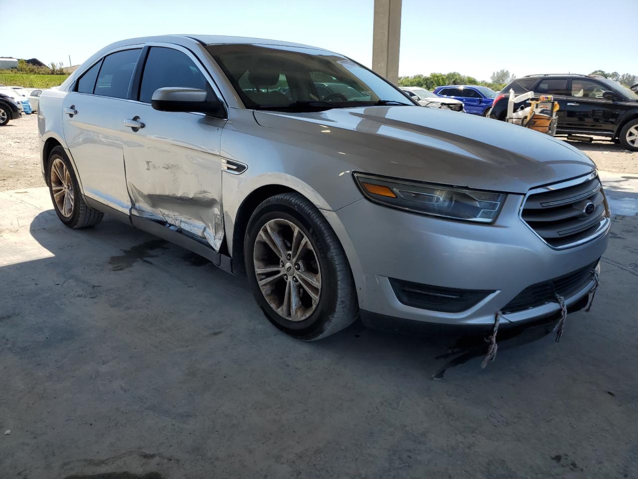 2013 Ford Taurus VIN 1FAHP2E88DG170974 Copart auction photo, side / front end damage thumbnail 4