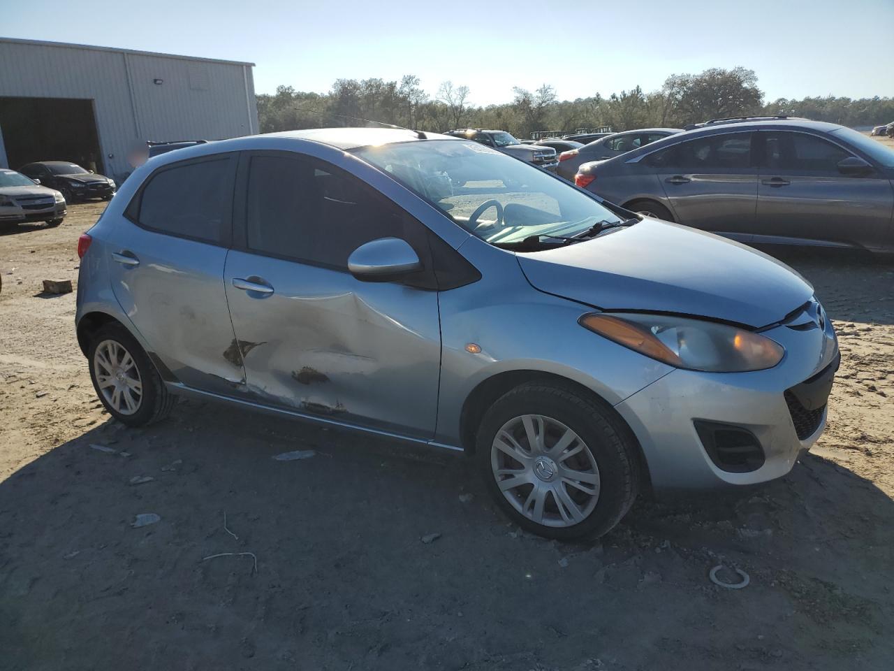 2013 Mazda 2 VIN JM1DE1KY4D0170735 Copart auction photo, side damage thumbnail 4