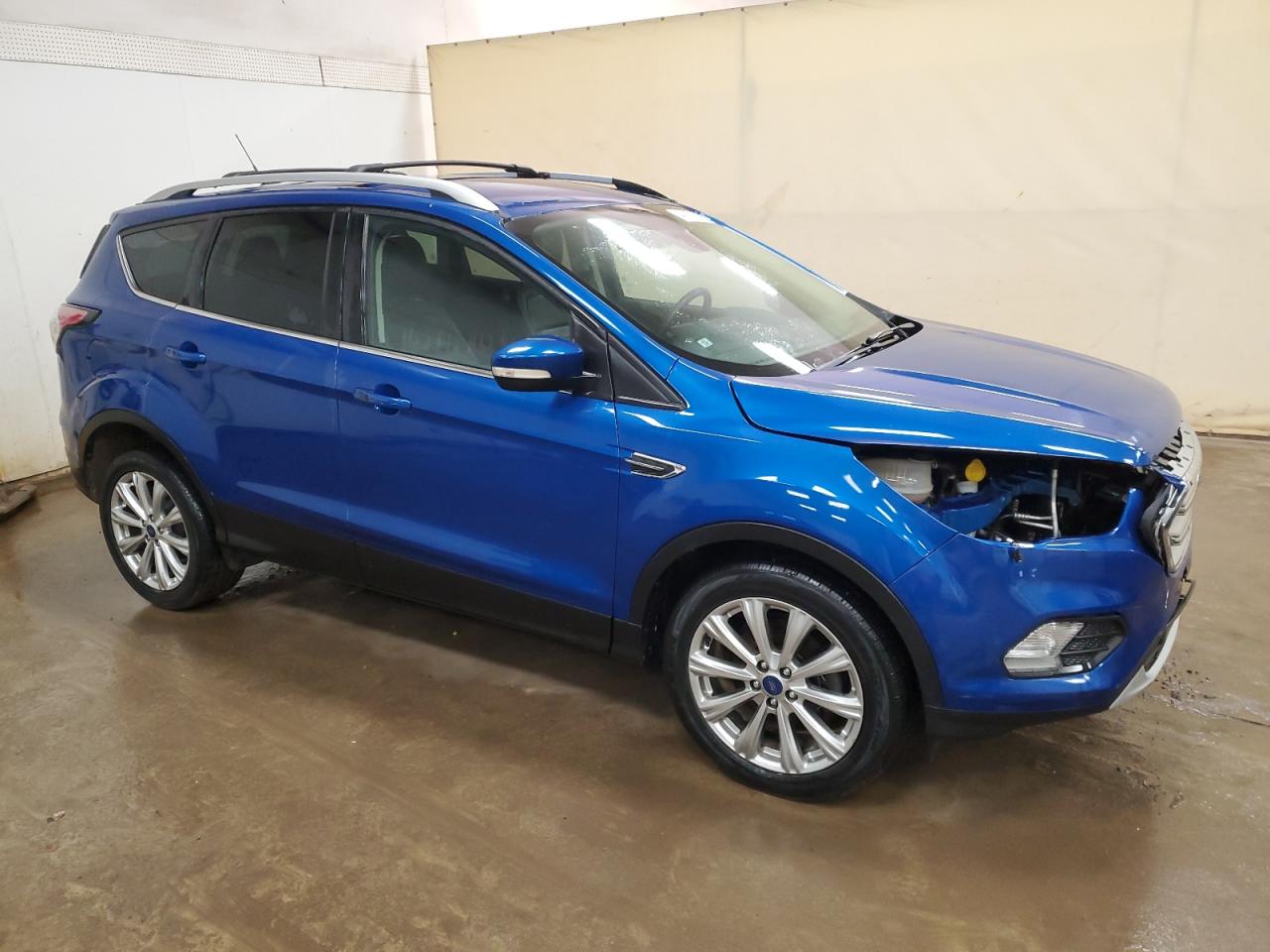 2017 Ford Escape VIN 1FMCU0JD2HUD18852 Copart auction photo, front end / minor dent/scratches damage thumbnail 4