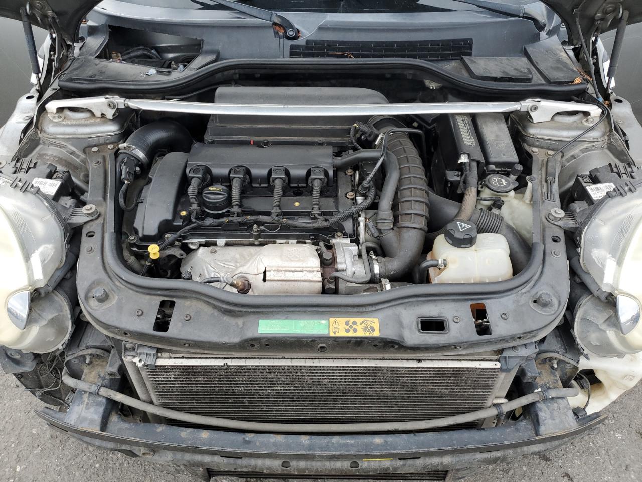 2009 MINI Cooper VIN WMWMM335X9TP73159 Copart auction photo, all over / vandalism damage thumbnail 12
