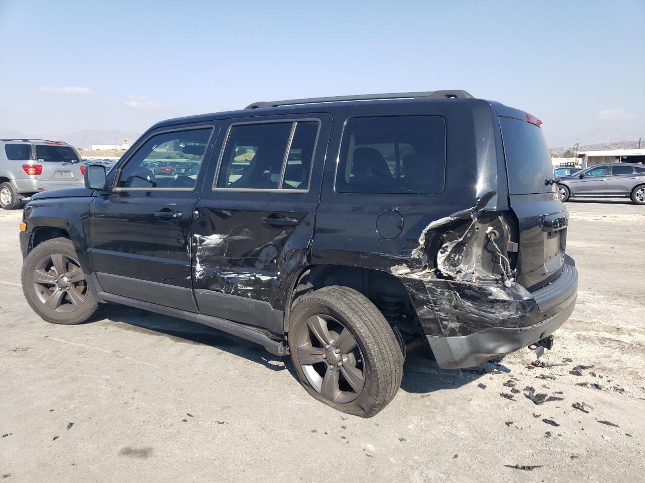 2014 Jeep Liberty (Patriot) VIN 1C4NJPFAXED812725 Copart auction photo, all over damage thumbnail 2