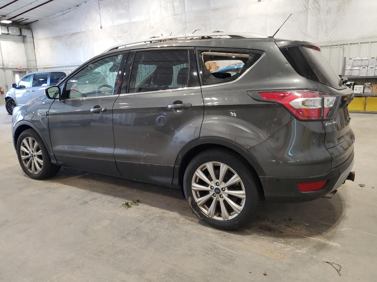2017 Ford Escape VIN 1FMCU9J94HUA03034 Copart auction photo, all over / top/roof damage thumbnail 2