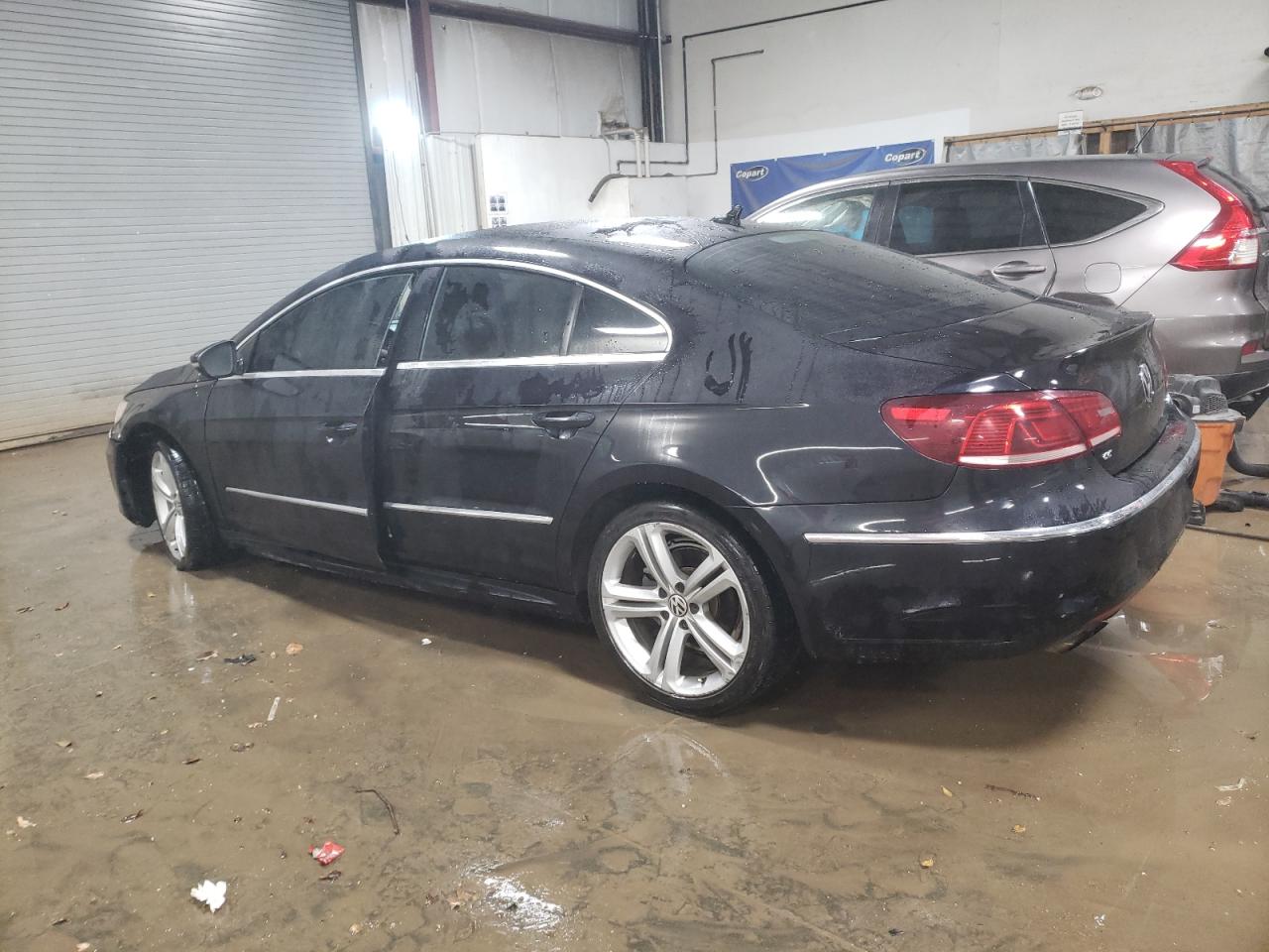 2014 Volkswagen Passat CC VIN WVWBN7AN3EE502914 Copart auction photo, side damage thumbnail 2