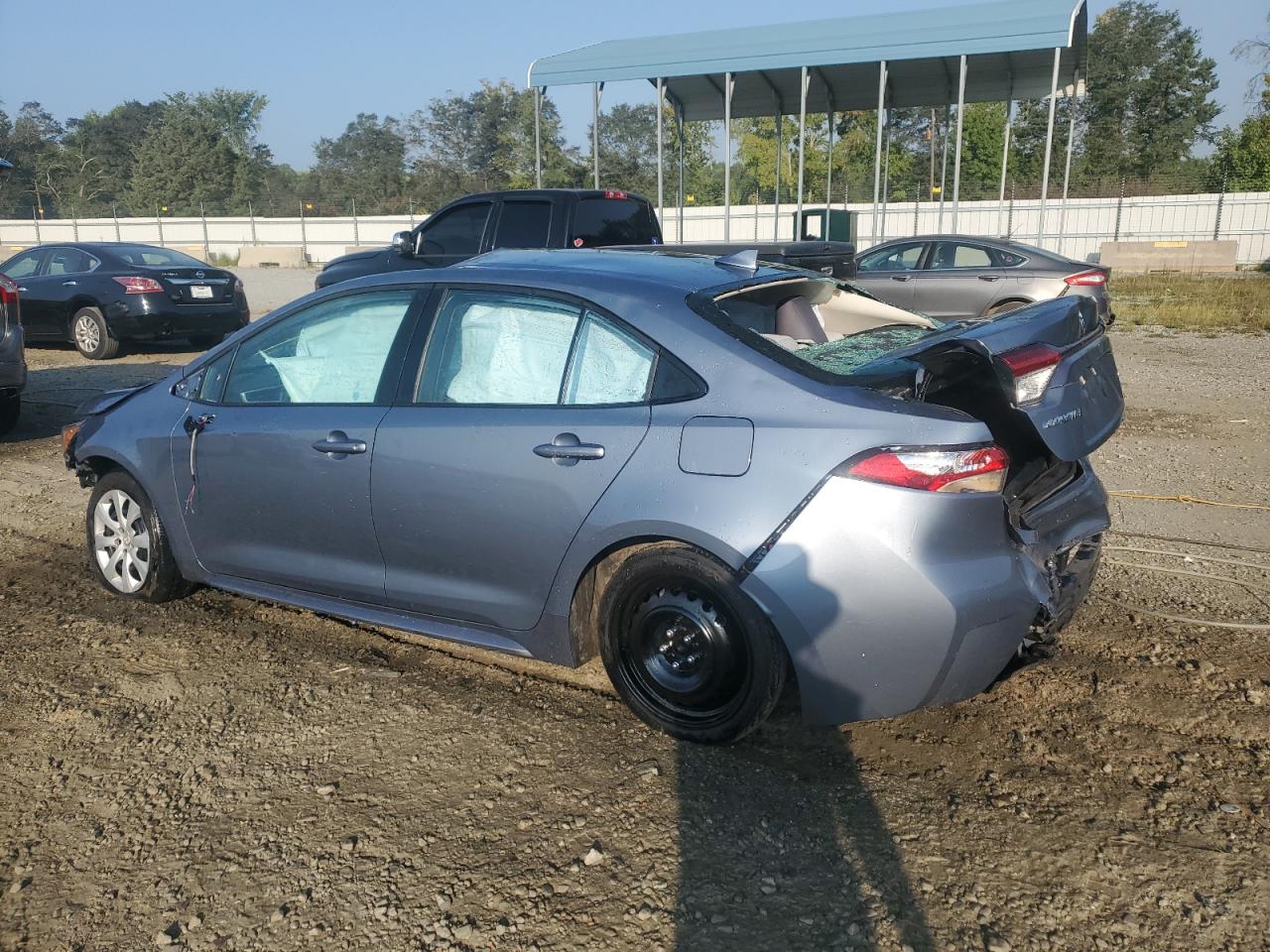 2022 Toyota Corolla VIN 5YFEPMAE3NP387014 Copart auction photo, all over damage thumbnail 2