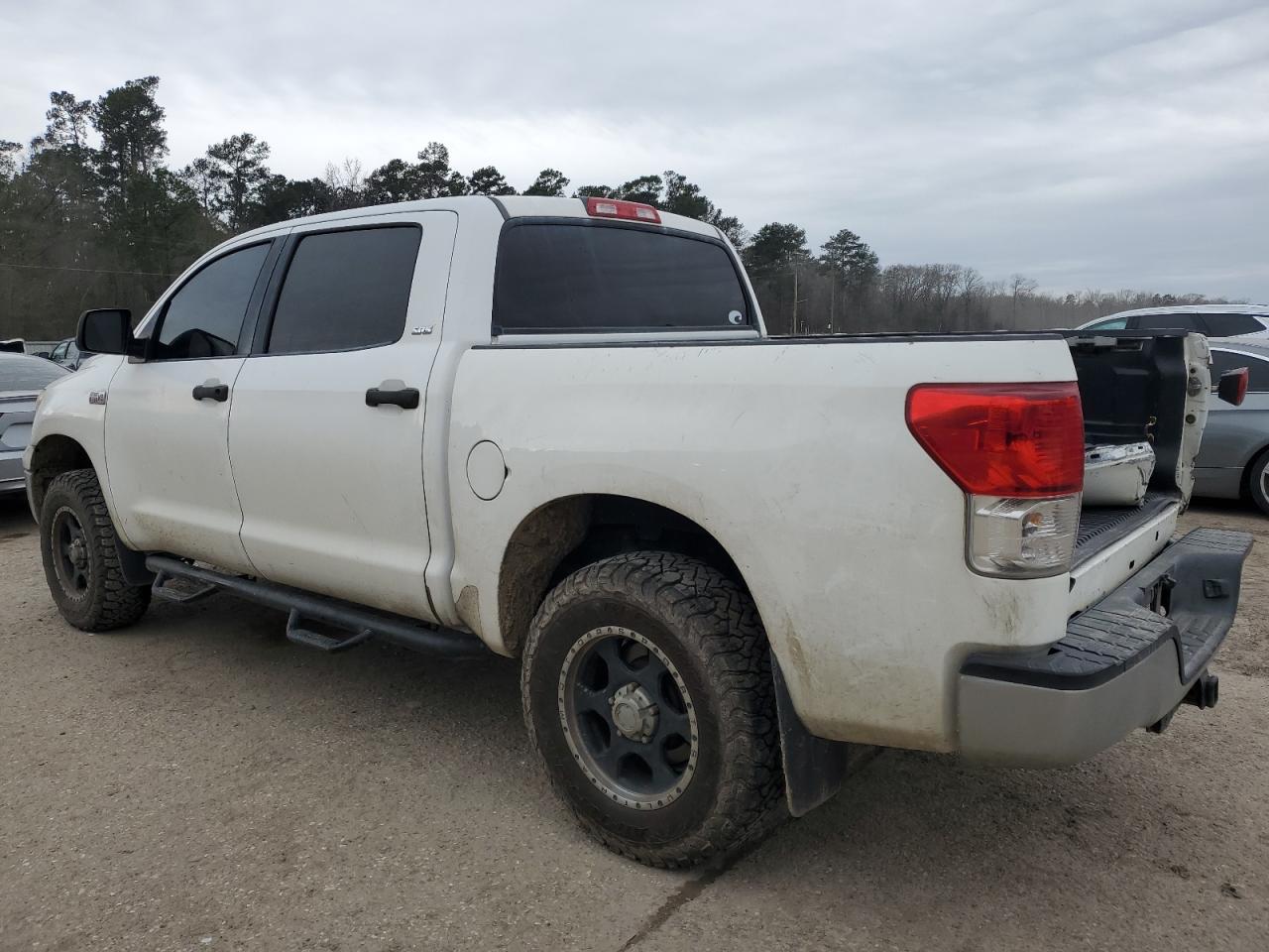 2010 Toyota Tundra VIN 5TFDW5F12AX132747 Copart auction photo, rear end / minor dent/scratches damage thumbnail 2