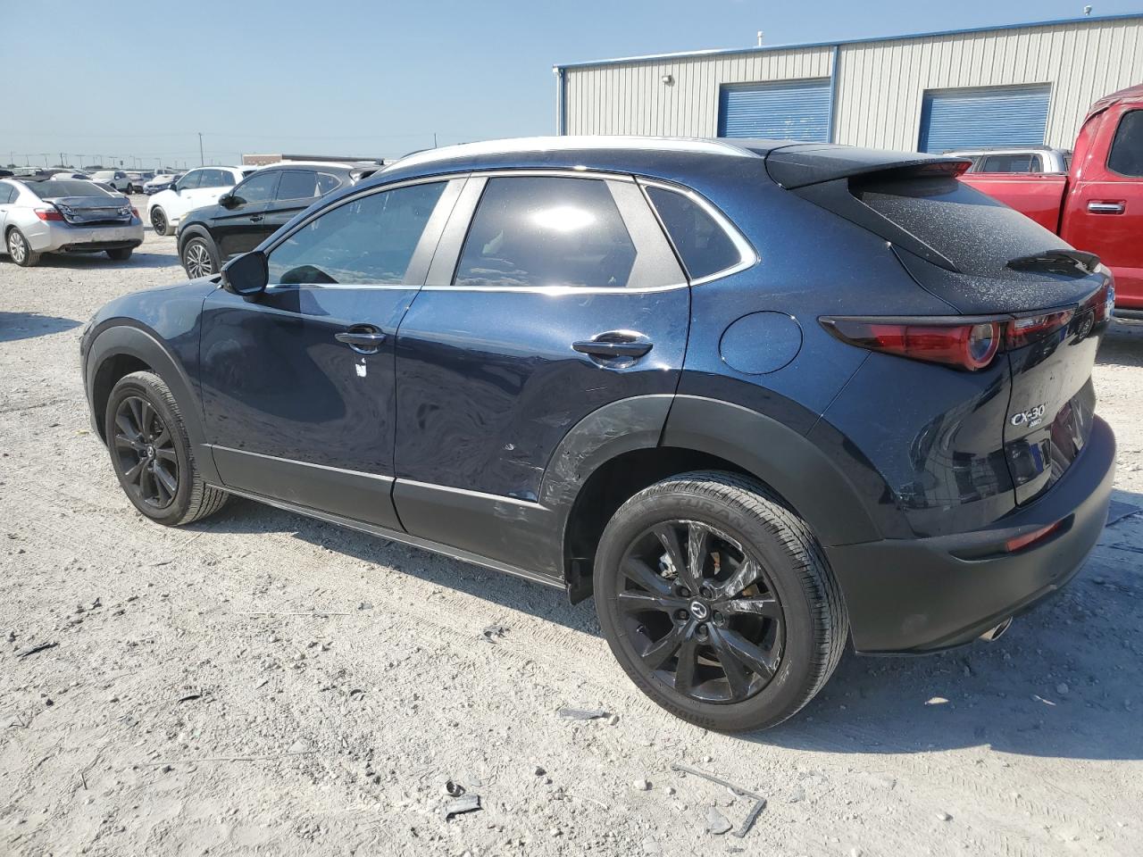 2024 Mazda CX-30 VIN 3MVDMBBM9RM630688 Copart auction photo, side / minor dent/scratches damage thumbnail 2