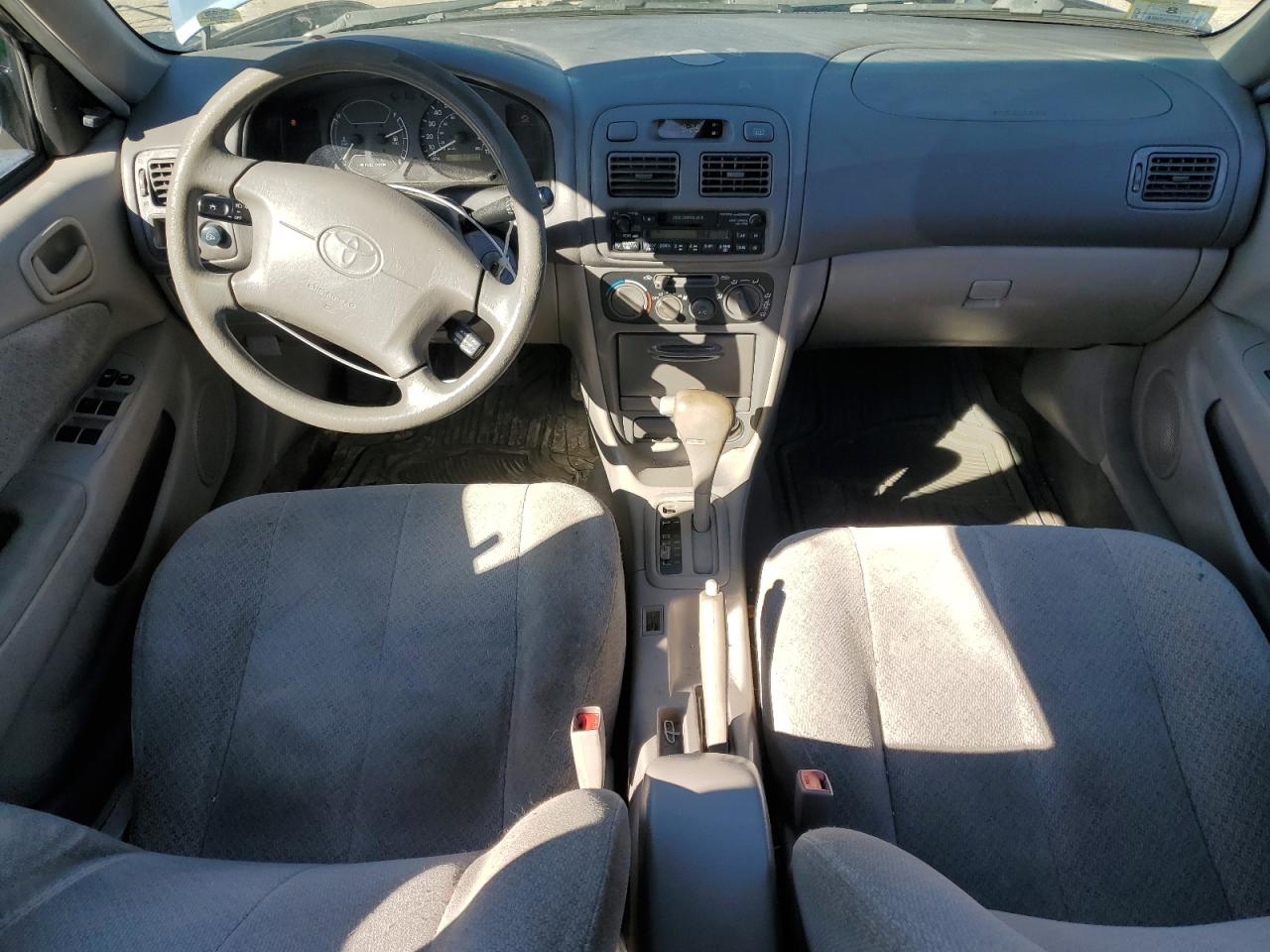 2000 Toyota Corolla VIN 2T1BR12E3YC317057 Copart auction photo, front end damage thumbnail 8