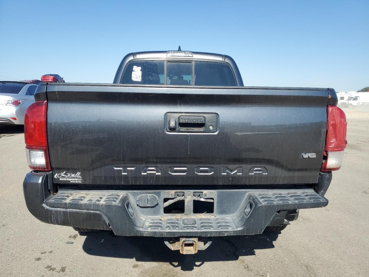 2016 Toyota Tacoma VIN 3TMDZ5BNXGM008725 Copart auction photo, front end / rear end damage thumbnail 6