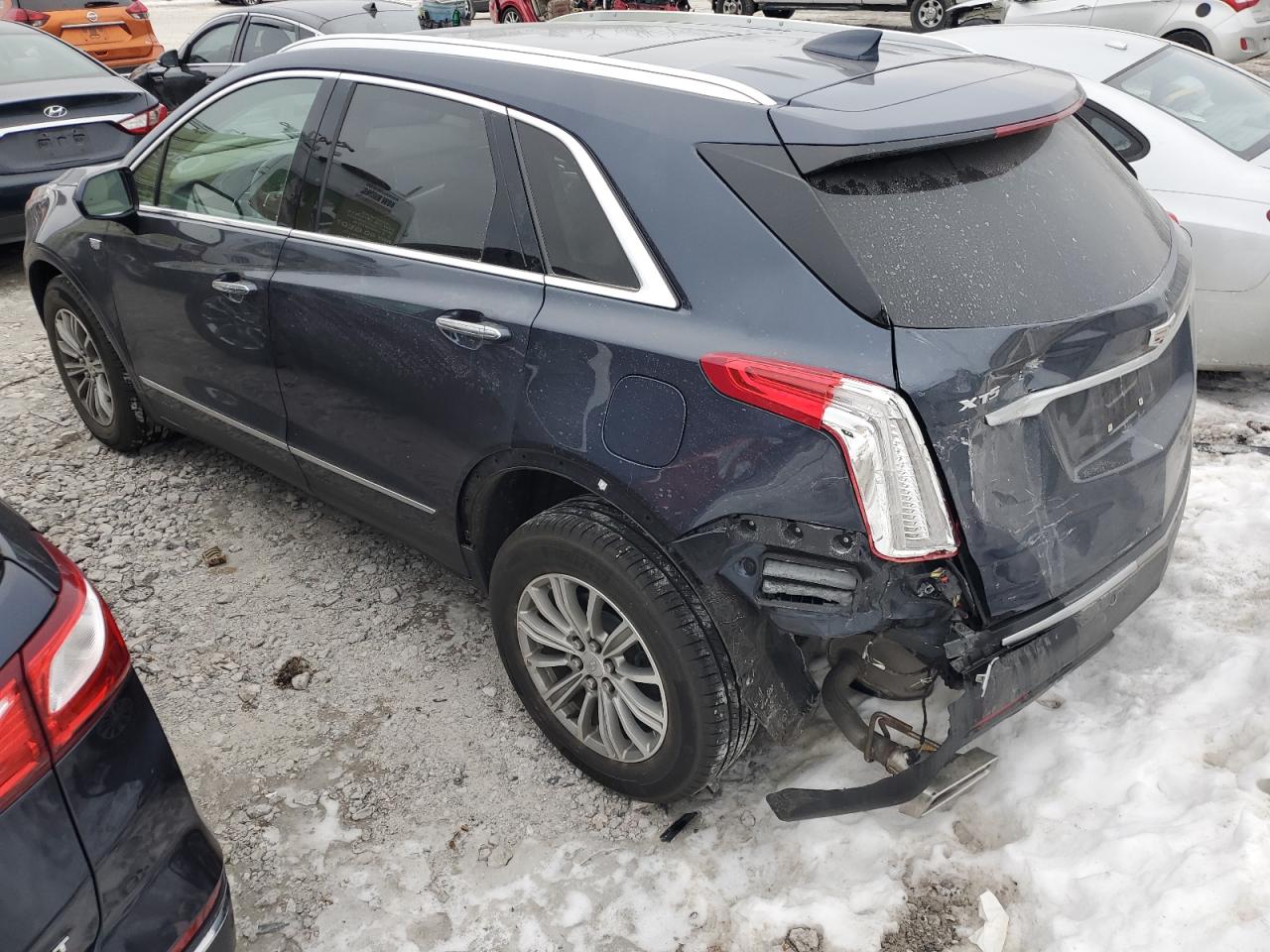 2018 Cadillac XT5 VIN 1GYKNCRS3JZ141619 Copart auction photo, rear end damage thumbnail 2