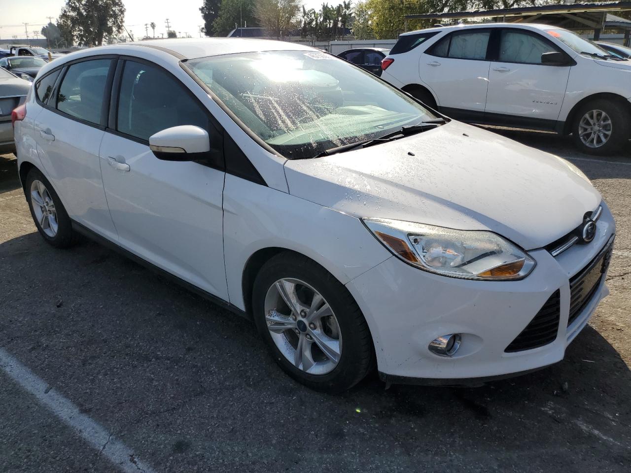 2012 Ford Focus VIN 1FAHP3K20CL423023 Copart auction photo, minor dent/scratches damage thumbnail 4