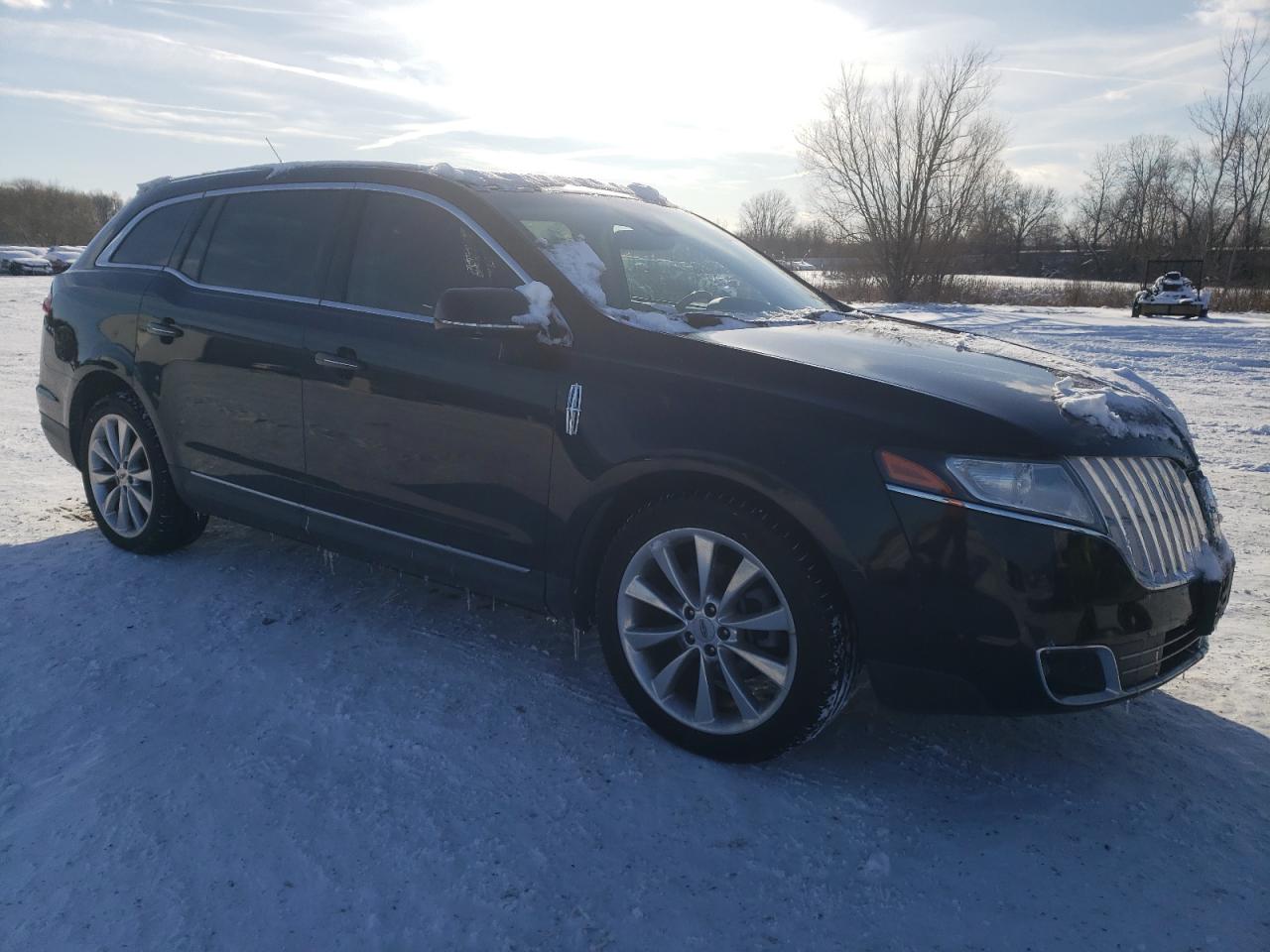 2011 Lincoln MKT VIN 2LMHJ5AT9BBJ53239 Copart auction photo, side / undercarriage damage thumbnail 4