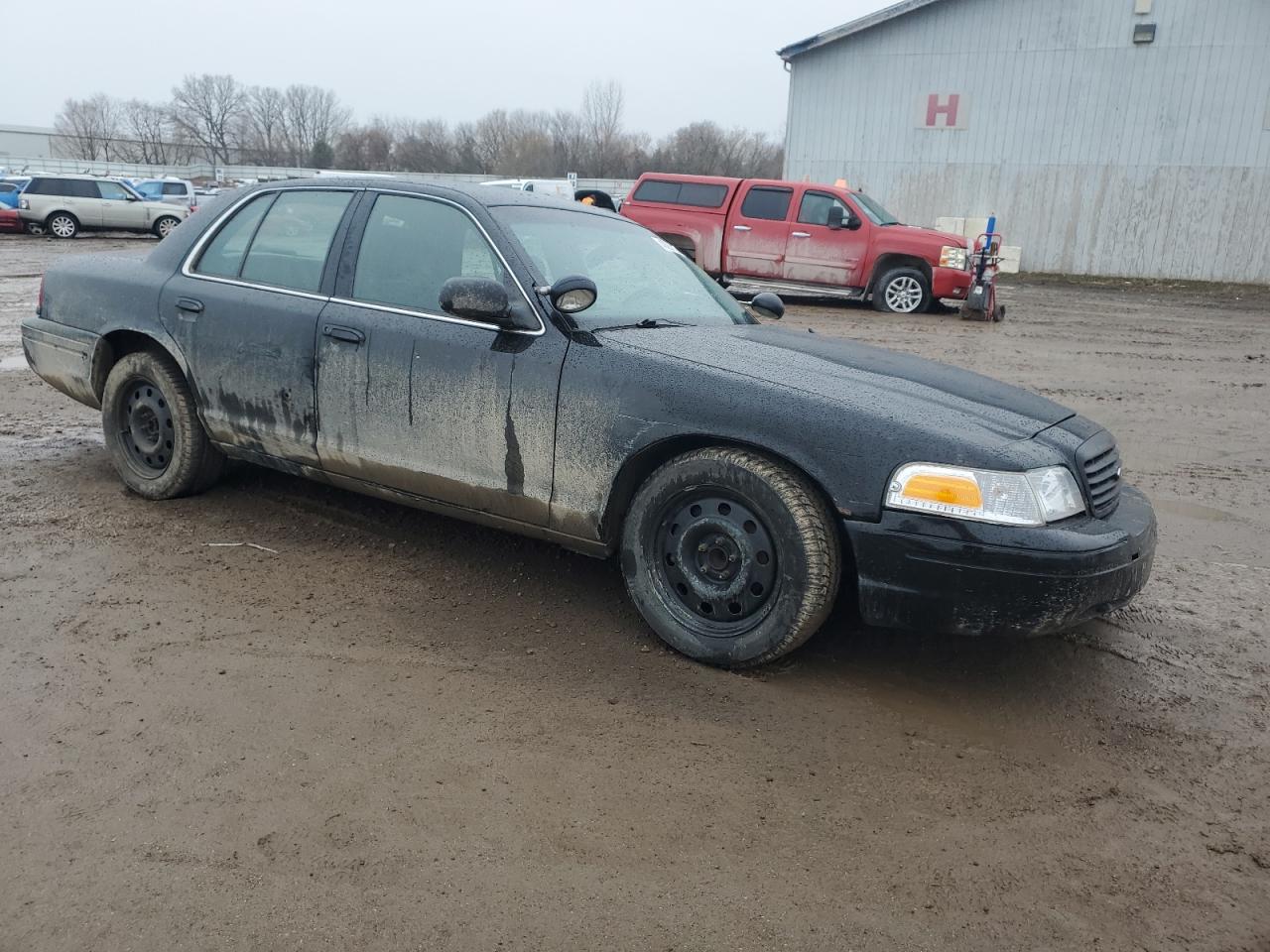 2009 Ford Crown Victoria VIN 2FAHP71V69X125929 Copart auction photo, front end / side damage thumbnail 4