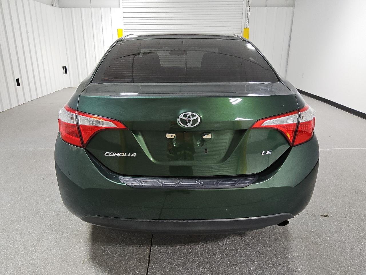 2015 Toyota Corolla VIN 5YFBURHE5FP338462 Copart auction photo, side / front end damage thumbnail 6