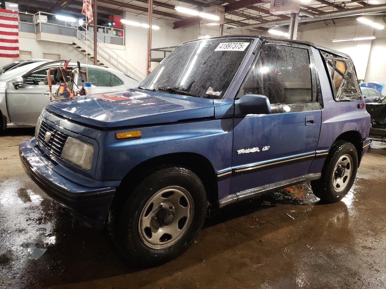 1995 GEO Tracker VIN 2CNBJ1866S6934268 - Copart auction photo