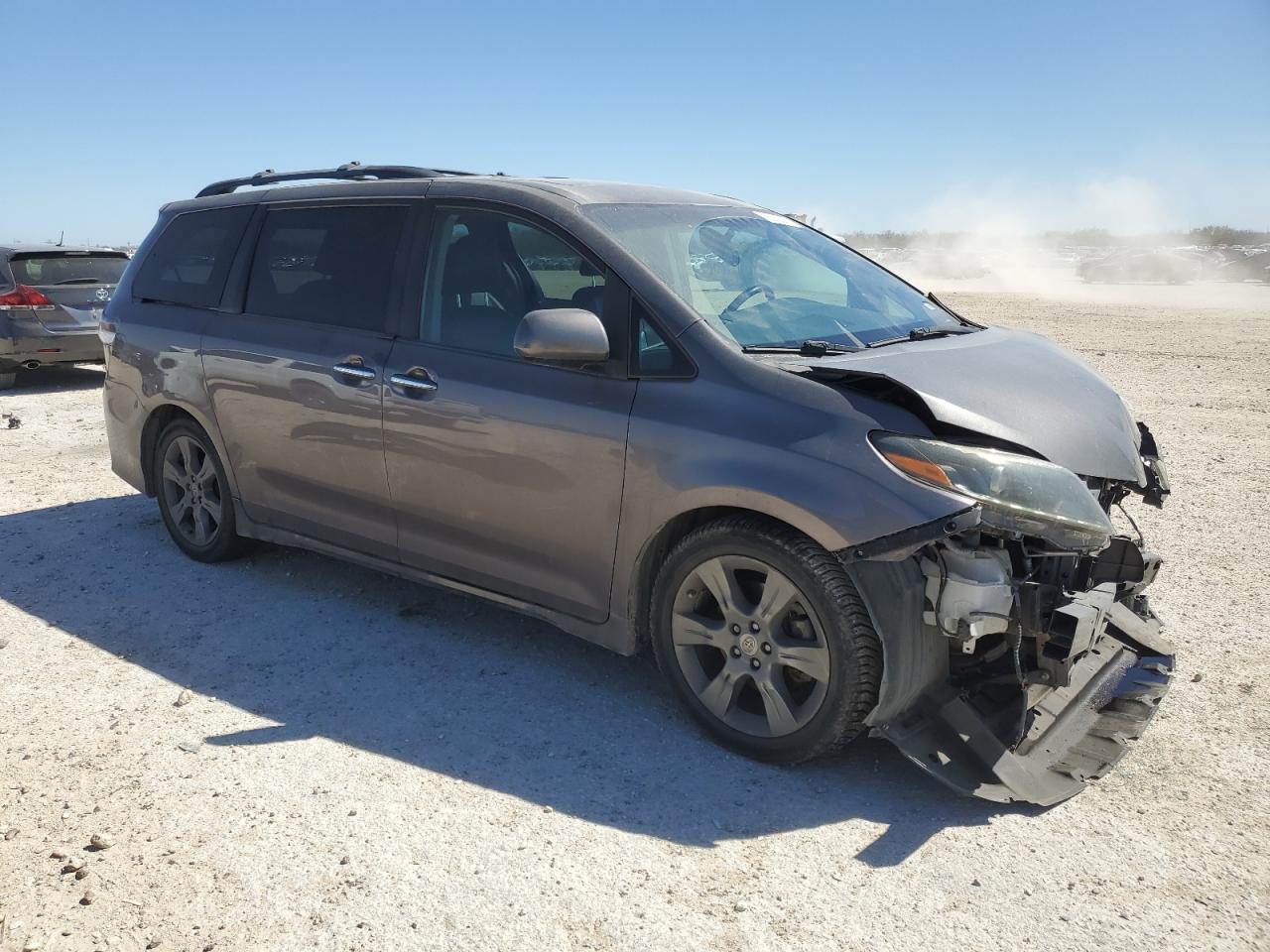 2015 Toyota Sienna VIN 5TDXK3DC3FS684448 Copart auction photo, all over damage thumbnail 4