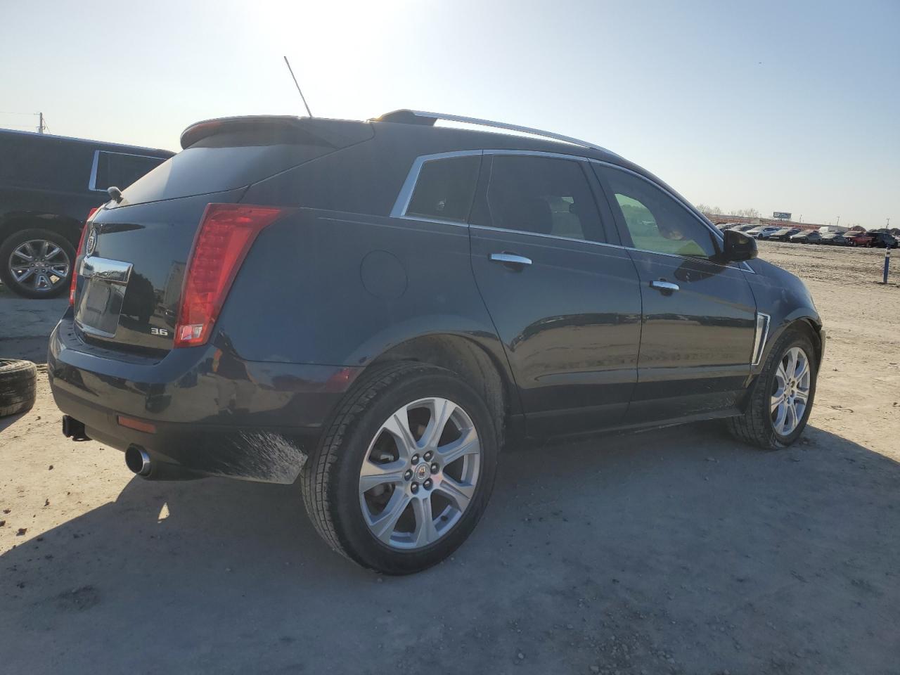 2016 Cadillac SRX VIN 3GYFNCE38GS552732 Copart auction photo, front end / side damage thumbnail 3