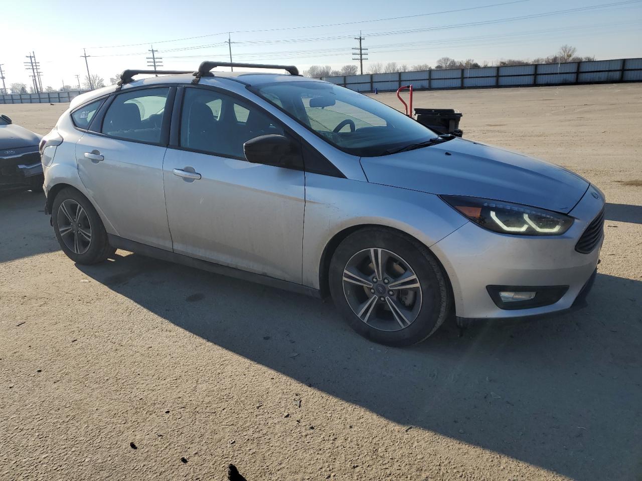 2016 Ford Focus VIN 1FADP3KE4GL208985 Copart auction photo, rear end damage thumbnail 4