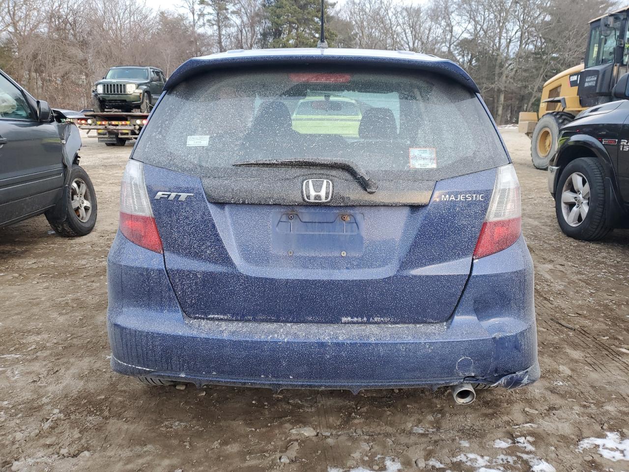 2010 Honda Fit VIN JHMGE8H49AS025716 Copart auction photo, side damage thumbnail 6