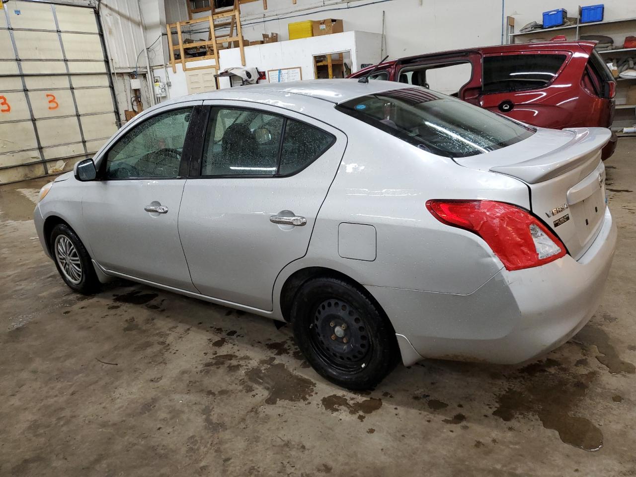 2014 Nissan Versa VIN 3N1CN7AP6EL838792 Copart auction photo, front end / hail damage thumbnail 2