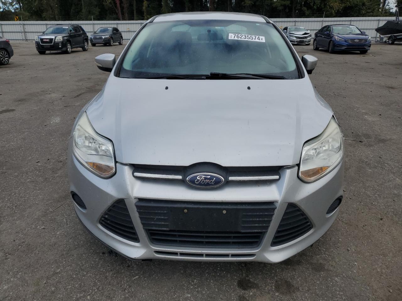 2014 Ford Focus VIN 1FADP3F24EL243250 Copart auction photo, front end / undercarriage damage thumbnail 5