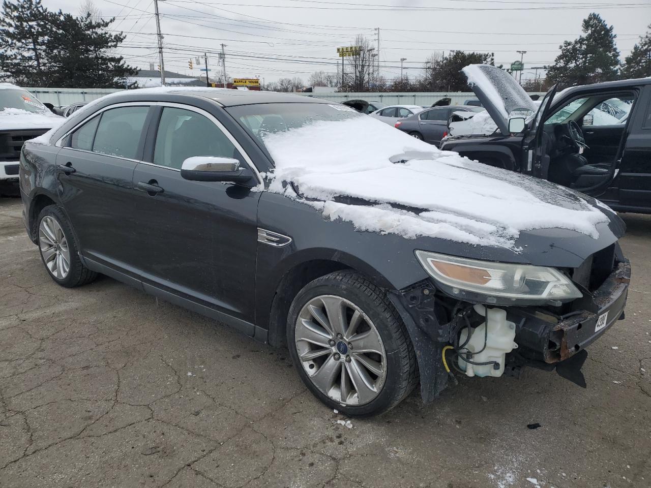 2010 Ford Taurus VIN 1FAHP2FW5AG152067 Copart auction photo, front end / side damage thumbnail 4
