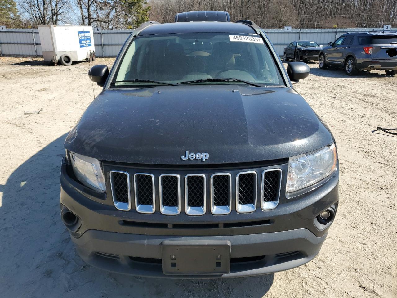 2011 Jeep Compass VIN 1J4NT1FAXBD165742 Copart auction photo, front end / side damage thumbnail 5
